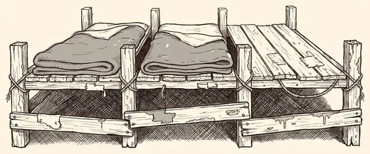 Ink drawing. Three narrow plank bunks in a row, built one against the next, blankets folded on the first two and the third stripped bare to its boards.